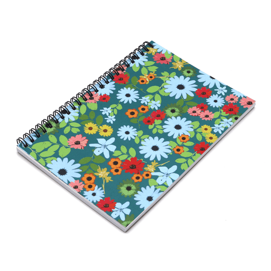 A5 journal in bright daisy floral design on a blue background. Side binding.
