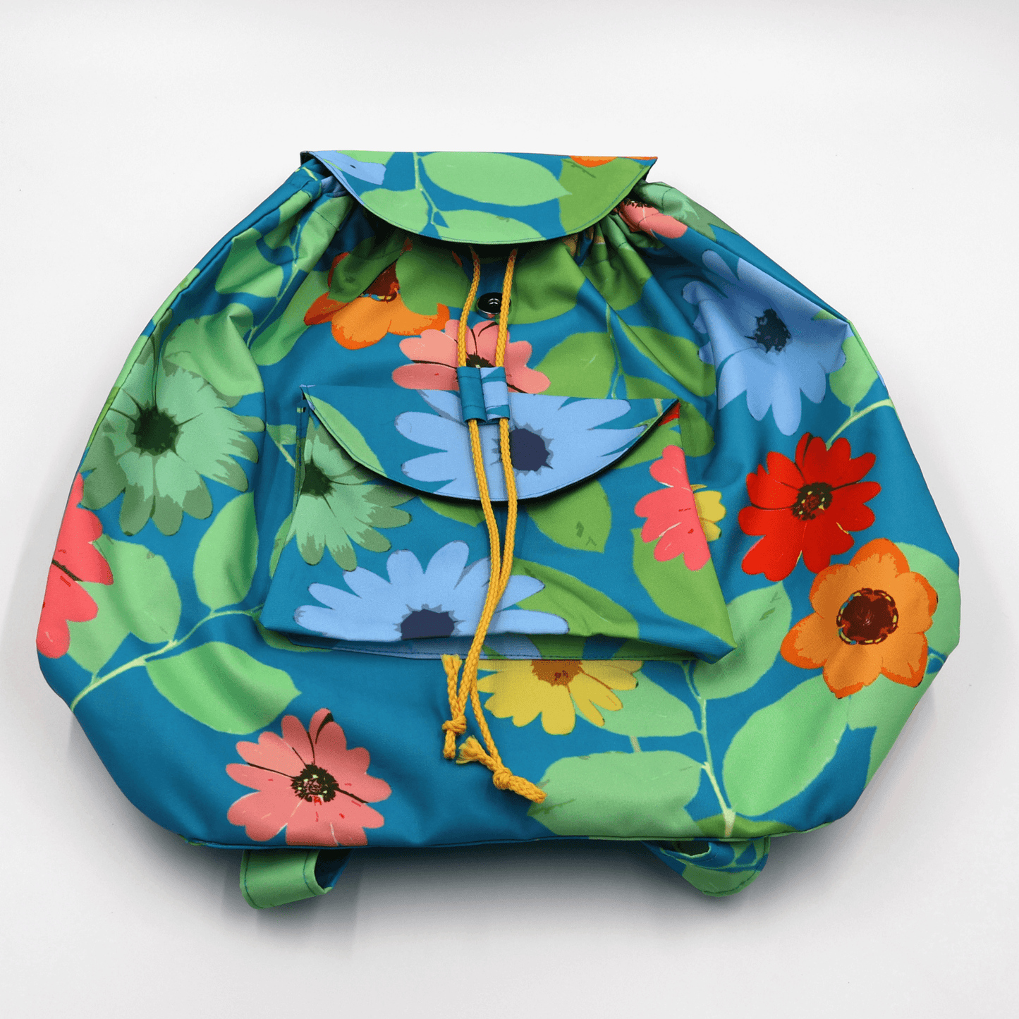 A lightweight, durable backpack with bright, colourful Daisy design on a blue background. High-quality materials. Flat view.