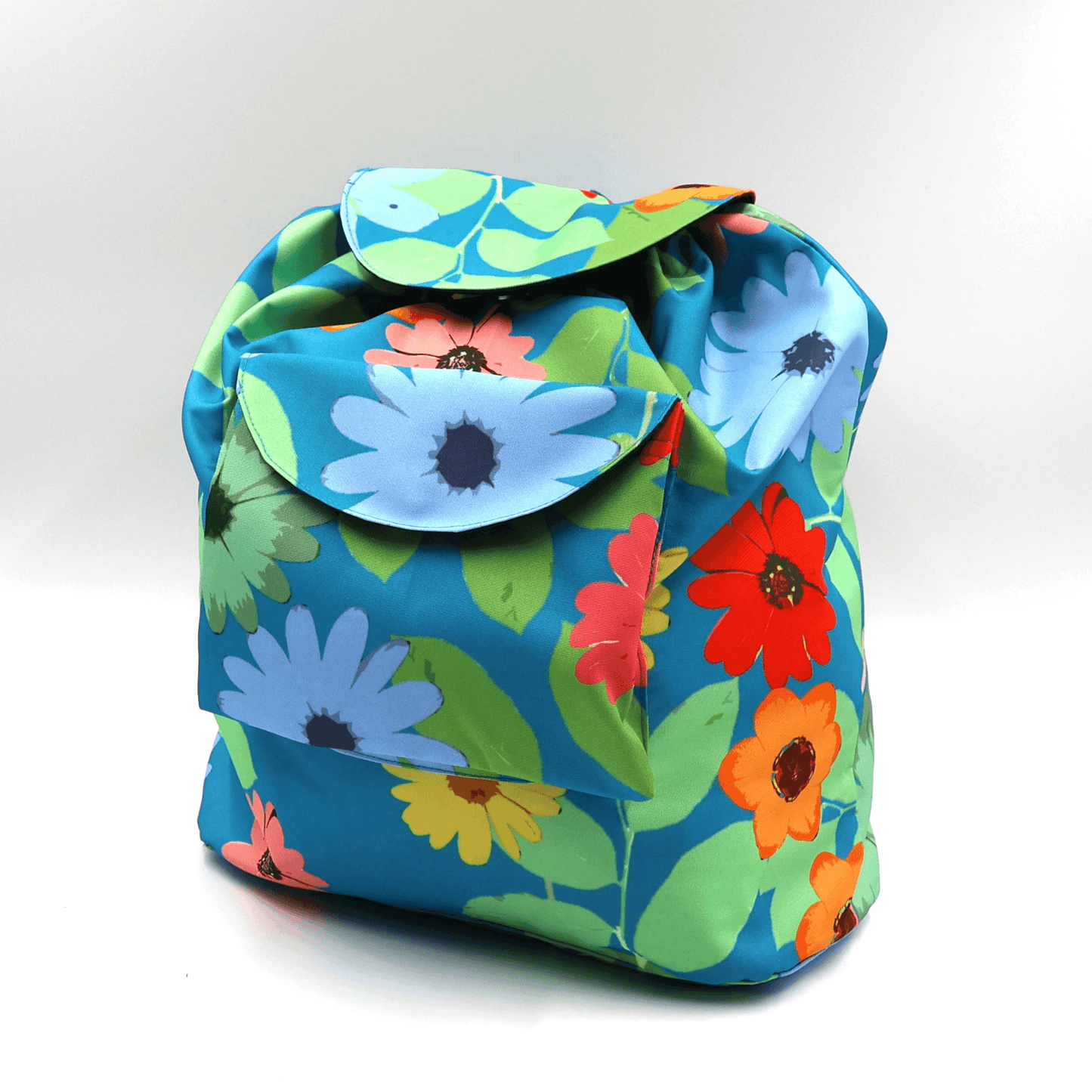 A lightweight, durable backpack with bright, colourful Daisy design on a blue background. High-quality materials. Side view.
