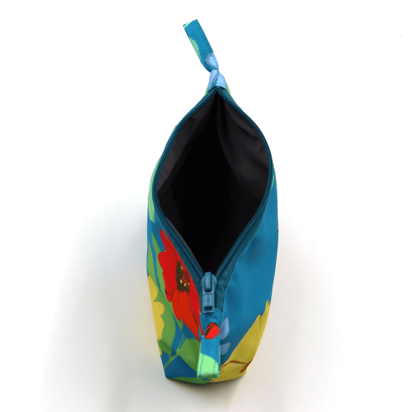 Open view of the Ellie B Blue Darling Makeup Bag showcasing its vibrant floral design and zipped closure.