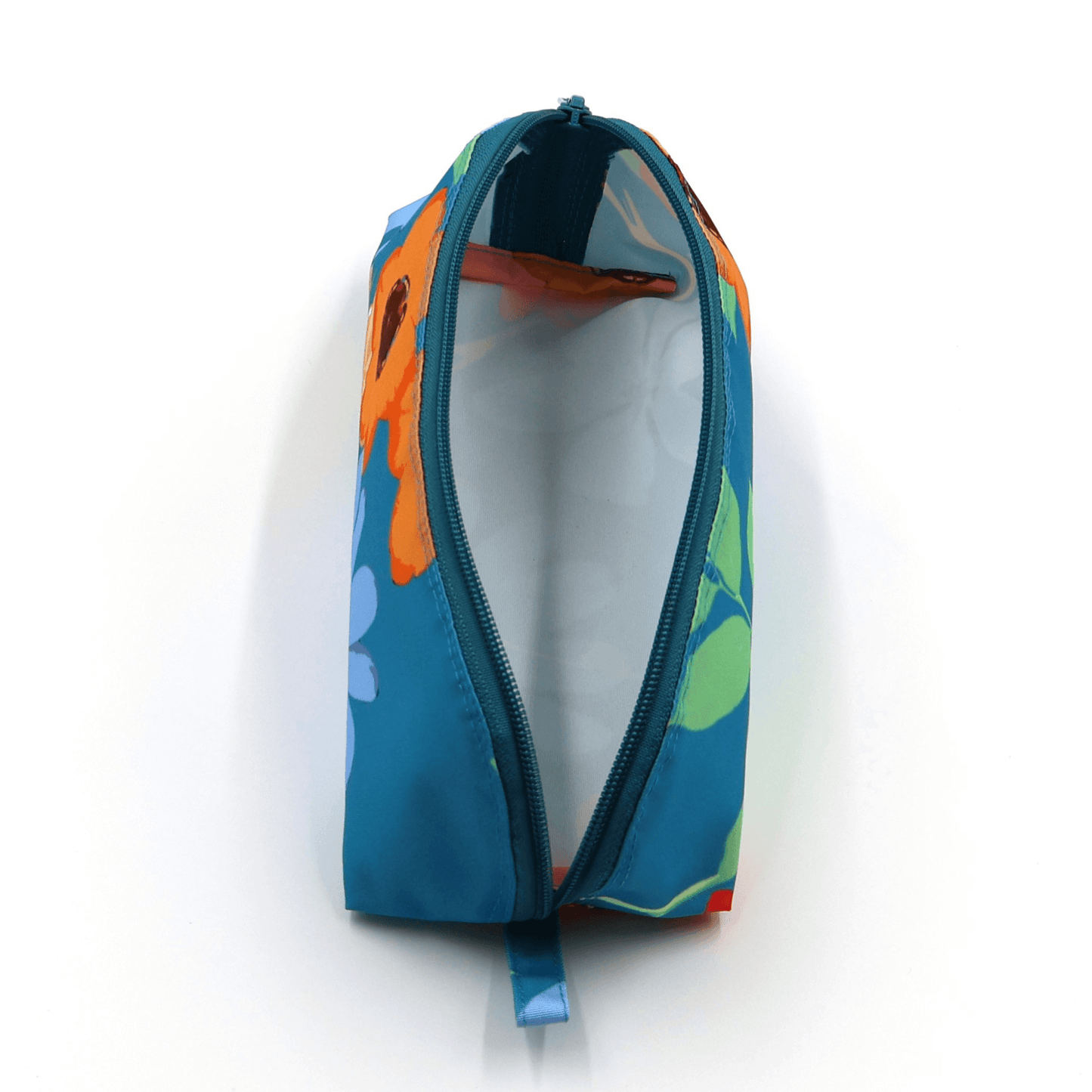 Pencil bag in vibrant daisy floral design on blue background, easy-to-clean fabric and zipper. Inside view.