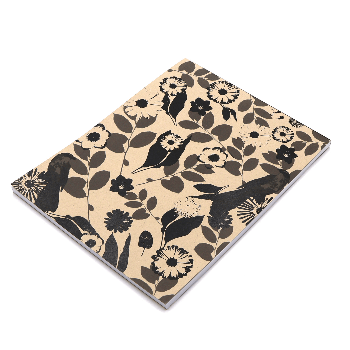 A4 Sketchpad with daisy floral design in black on a beige sand background.