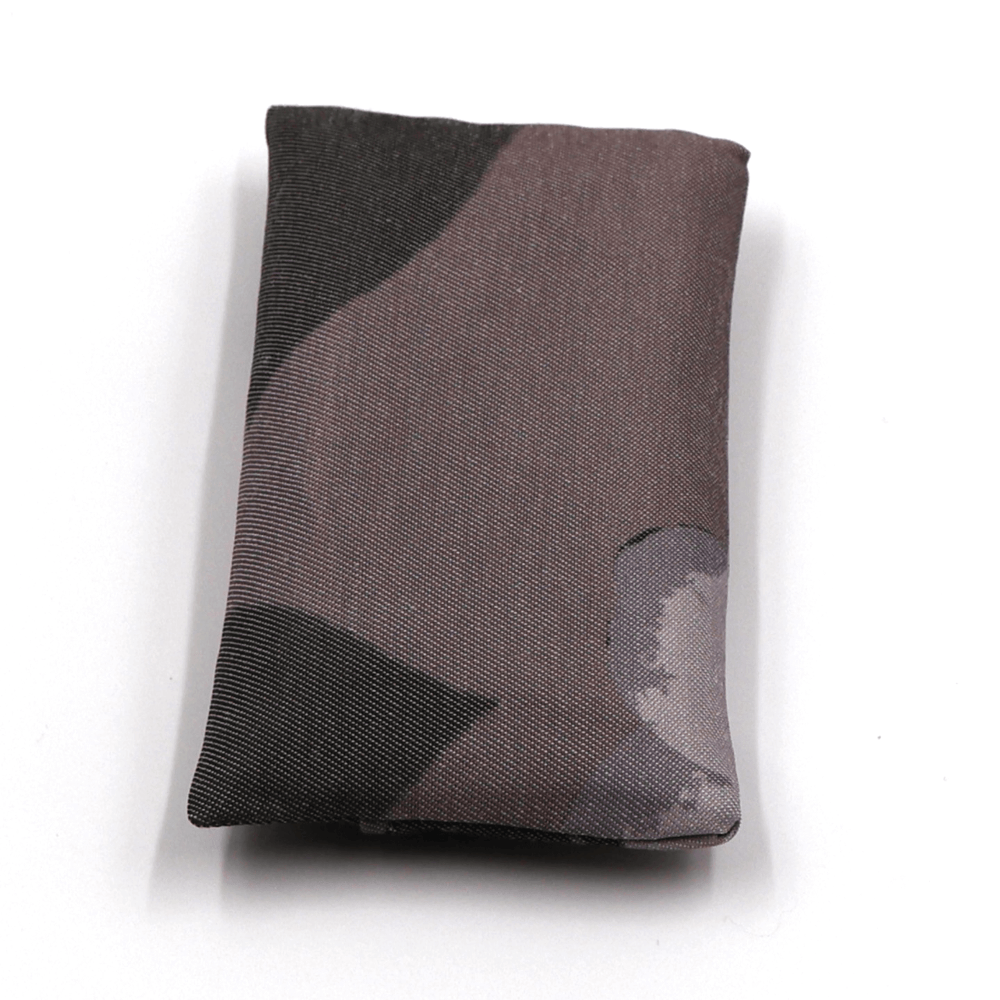 Fold up shopping bag with daisy floral design in dark and light greys and mauve.