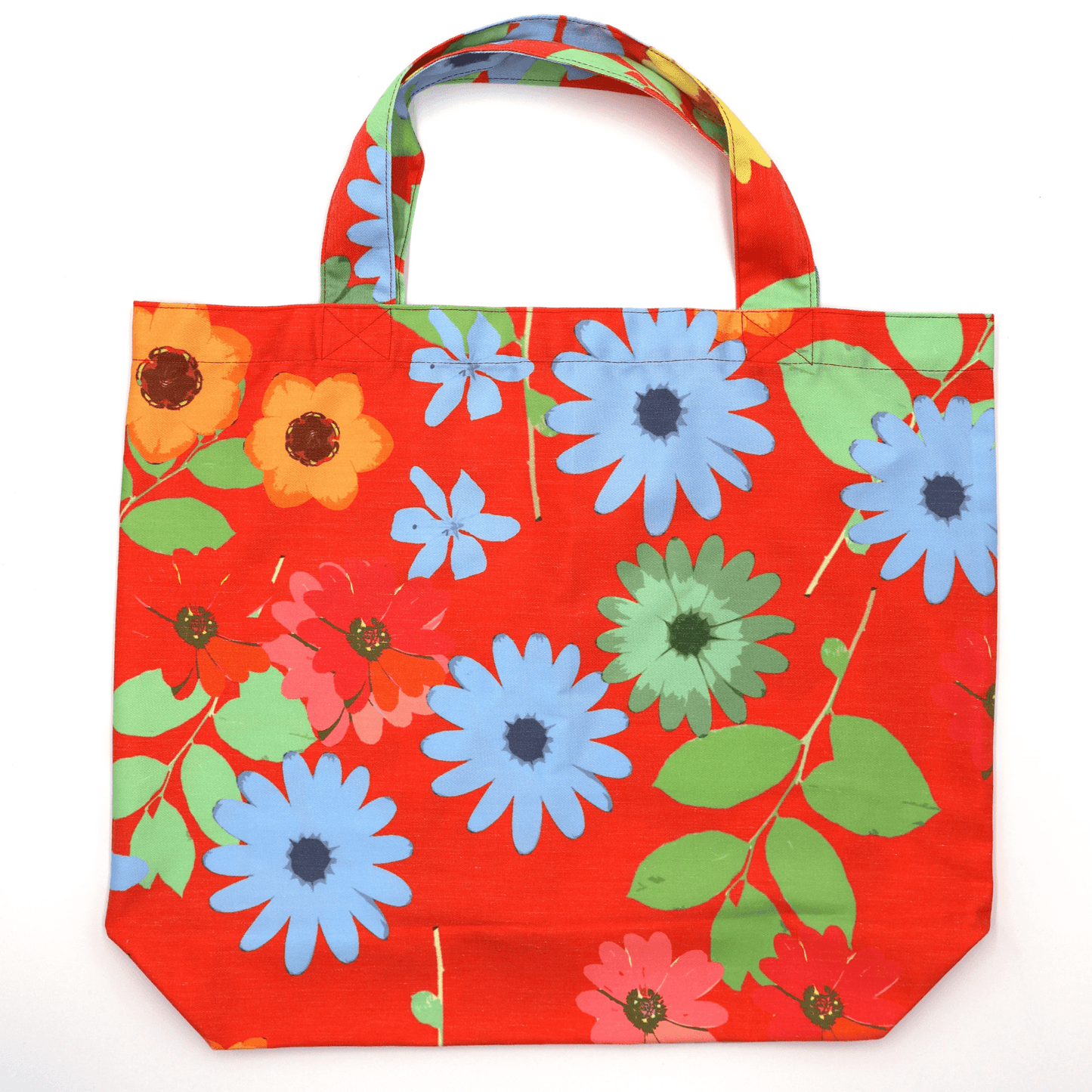 A bright, beautiful tote bag with Daisy design on a red background. Perfect finishes. Flat view.
