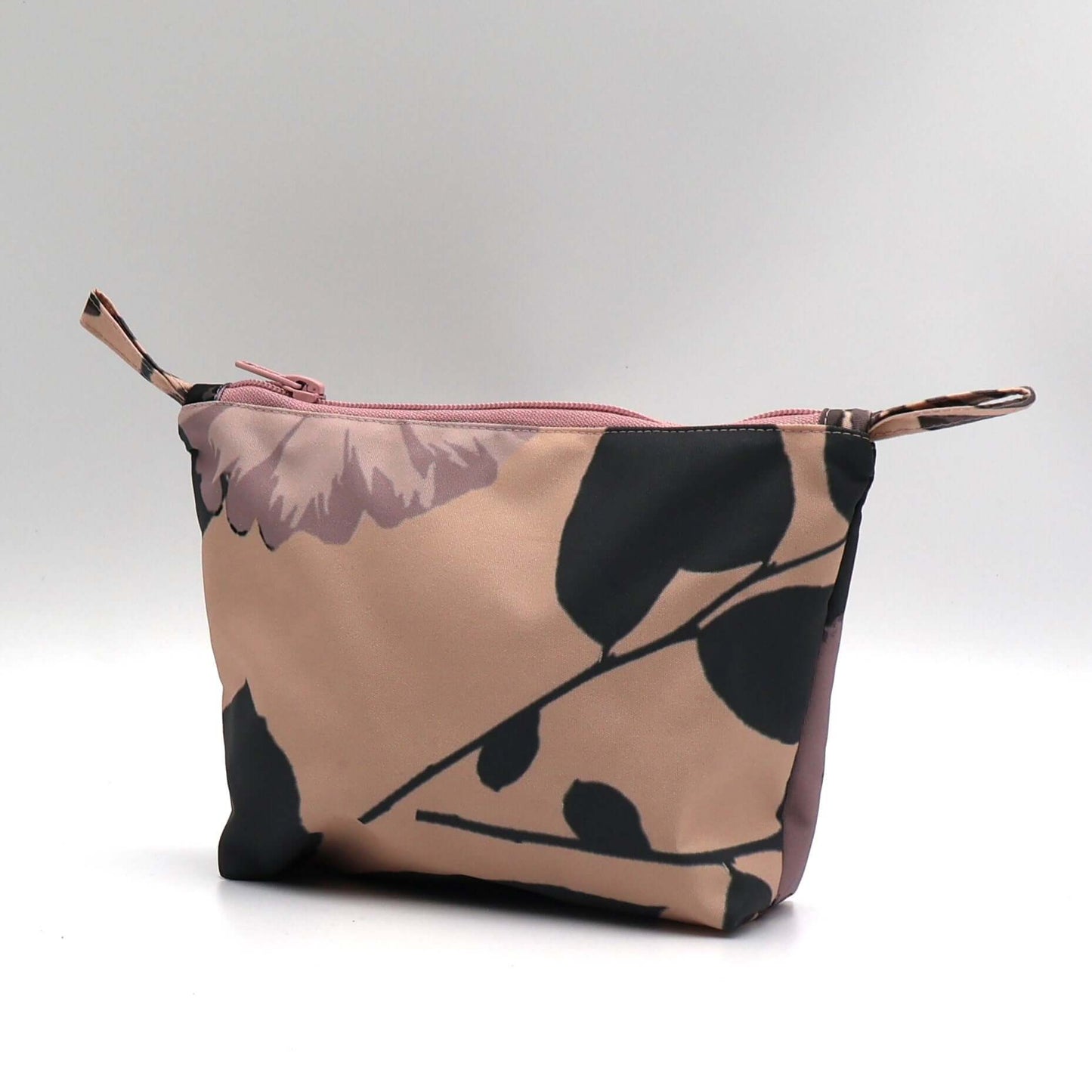 Dusky Pink and dark grey daisy makeup bag, floral design, perfect for organizing beauty products. Side view.