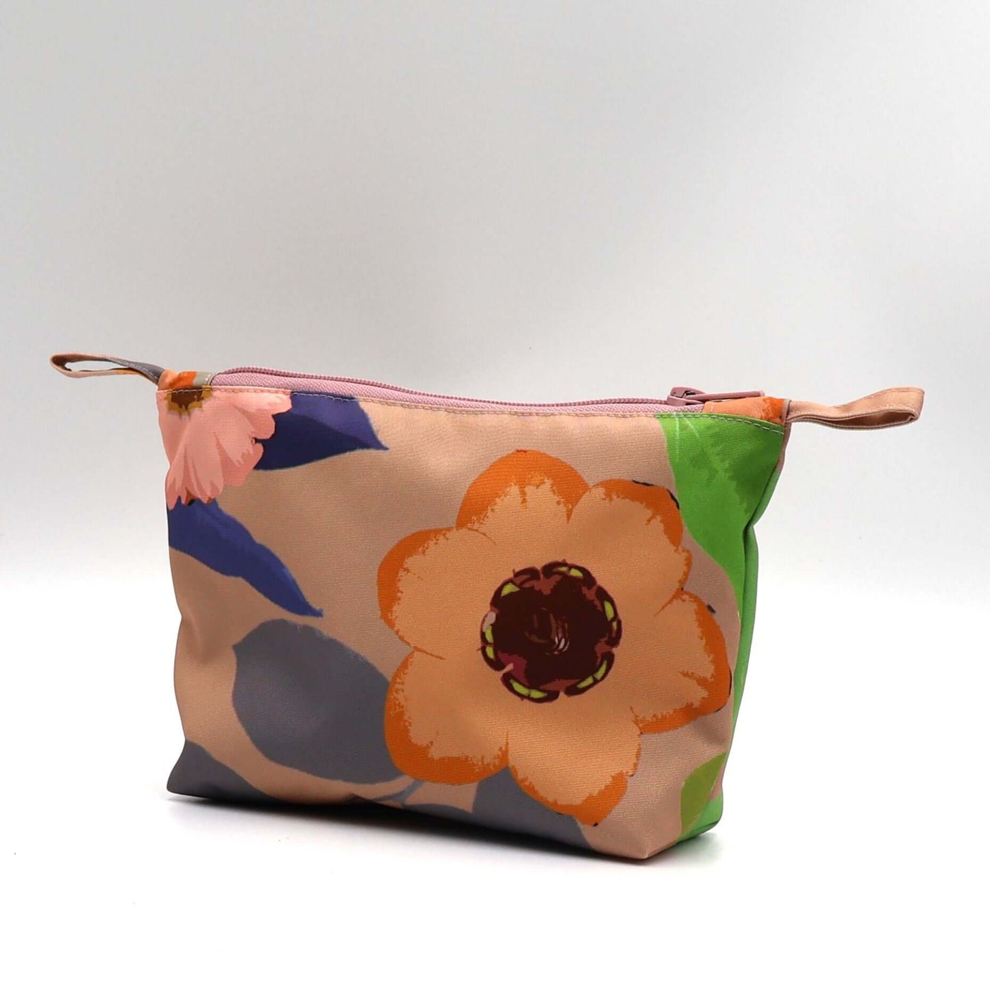 Peach daisy makeup bag, colorful floral design, perfect for organizing beauty products. Side view.