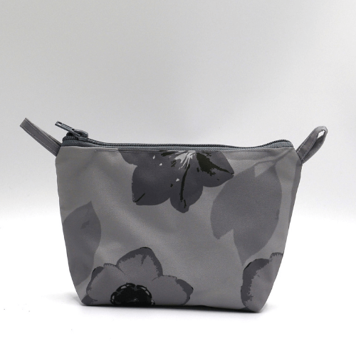 Ellie Bosch dark and light grey floral makeup bag, zipped closure, perfect for organizing beauty products.