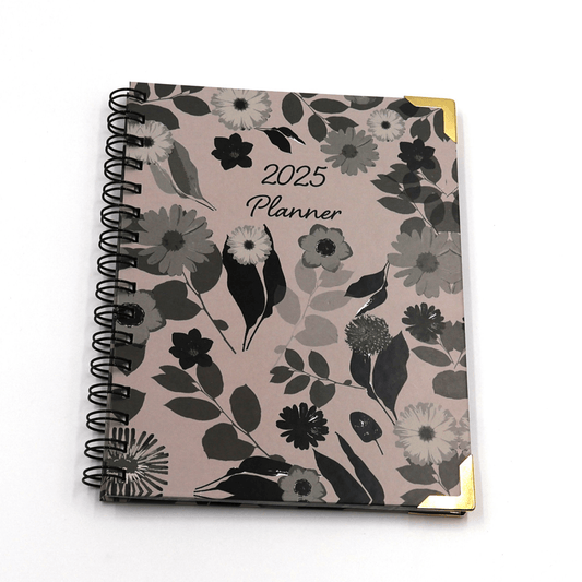 A5 Daily planner with dark and light mauve floral design on a soft mauve background. Hard cover.