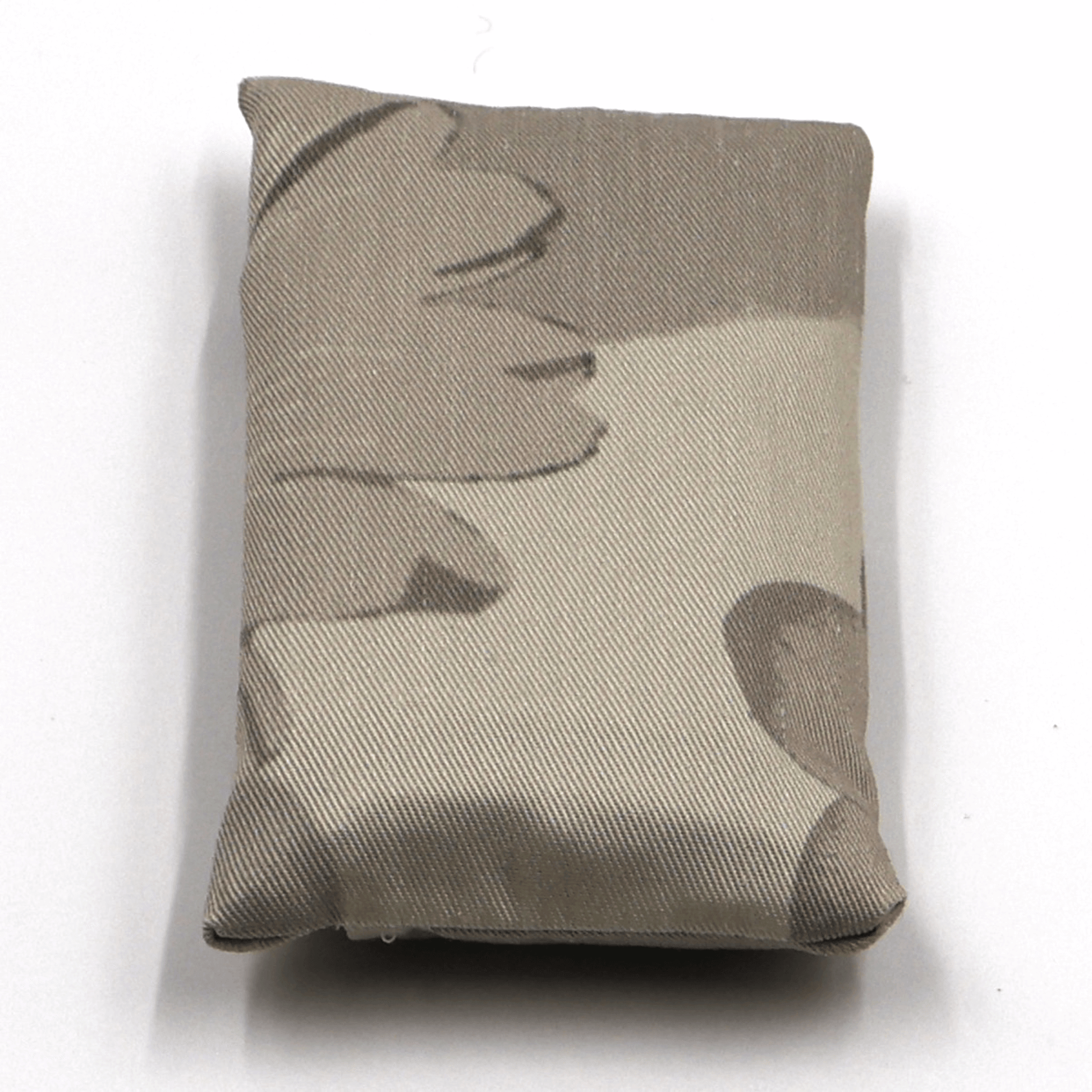 Fold up shopping bag with daisy floral design in dark and light beige and taupe.