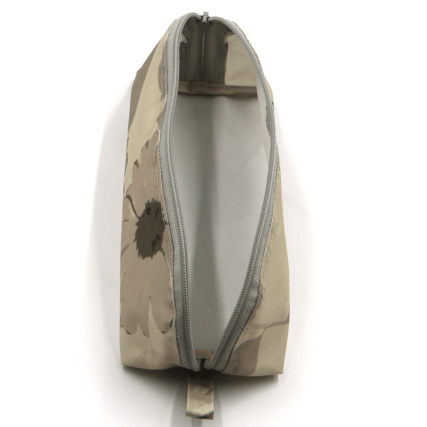 Pencil bag in beige and brown daisy floral design on soft ivory background. Top view with open zipper.