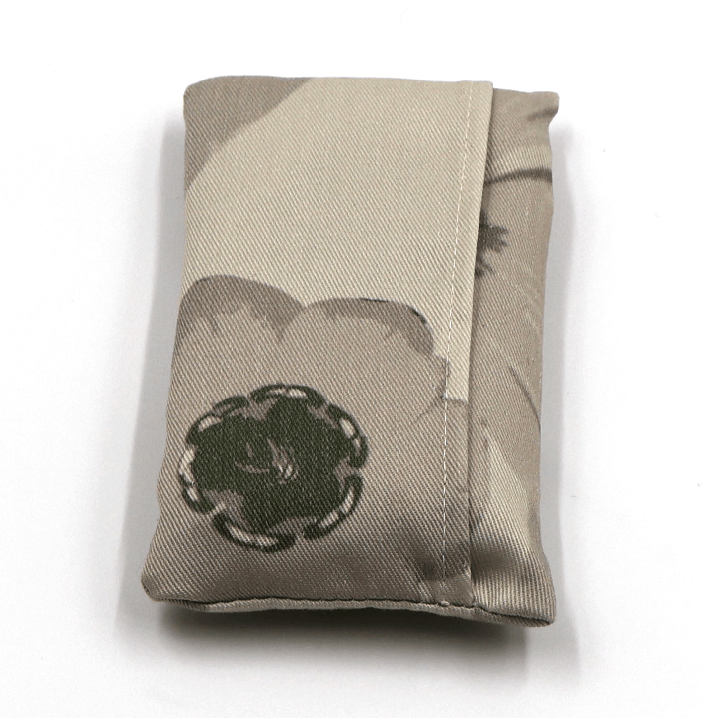Fold up shopping bag with daisy floral design in dark and light beige and taupe. Fold view.