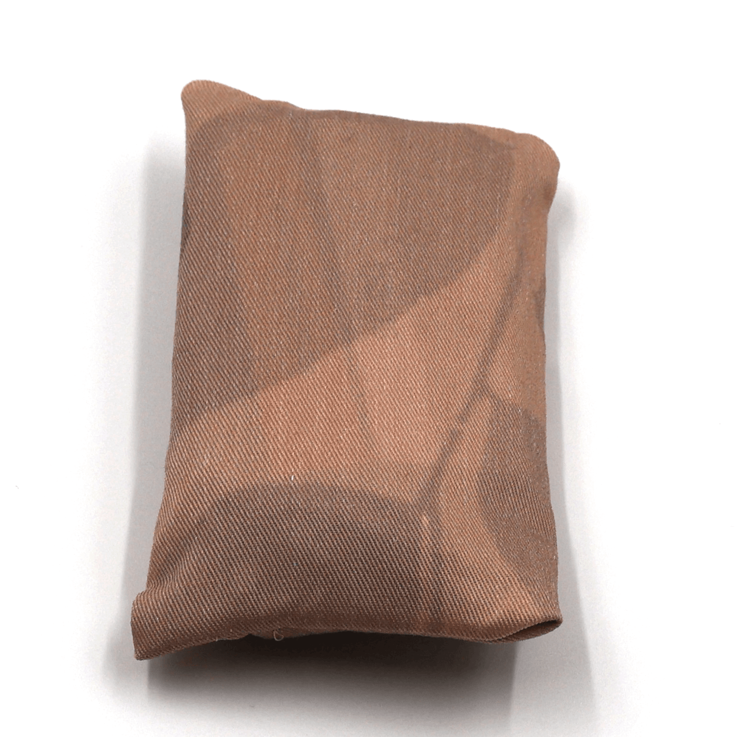 Fold up shopping bag in a daisy floral design on peach background.