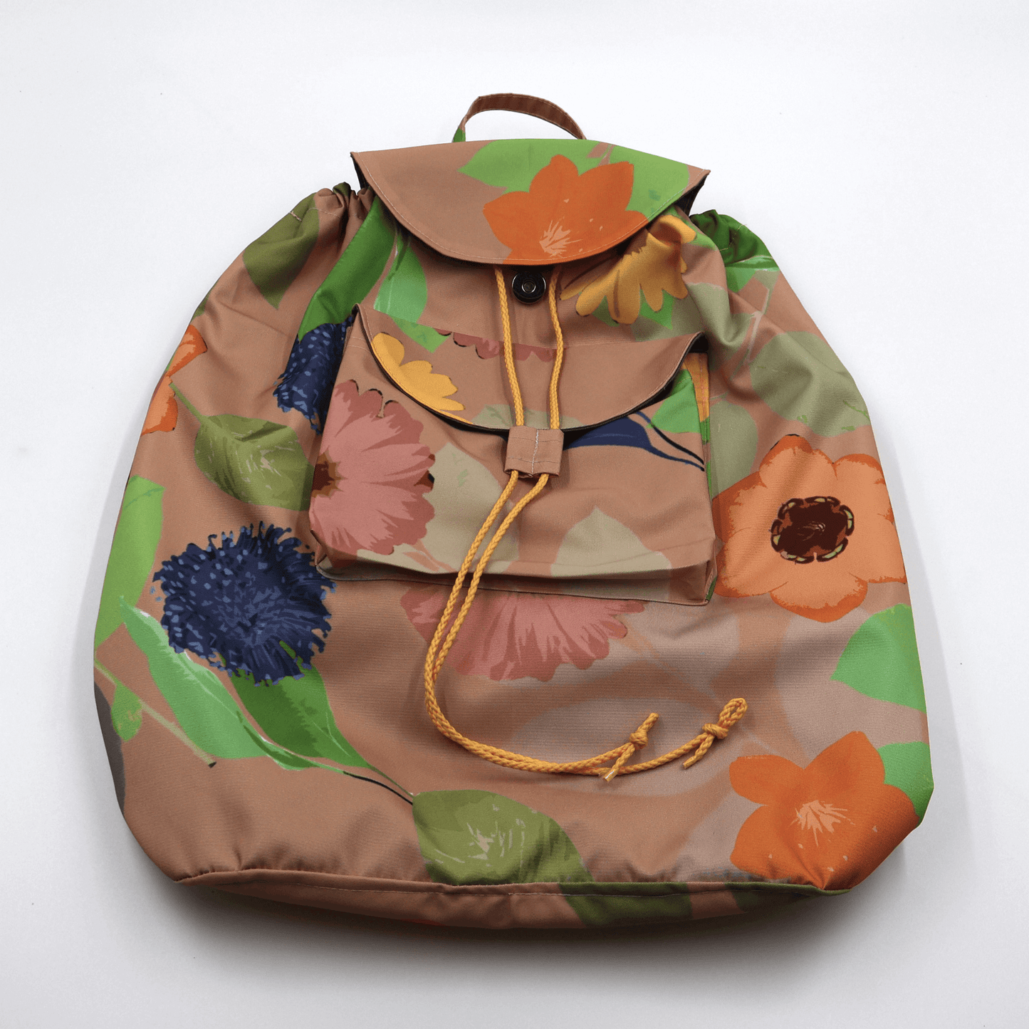 Lightweight backpack with drawstring and orange daisy floral design on dusky peach/orange background.