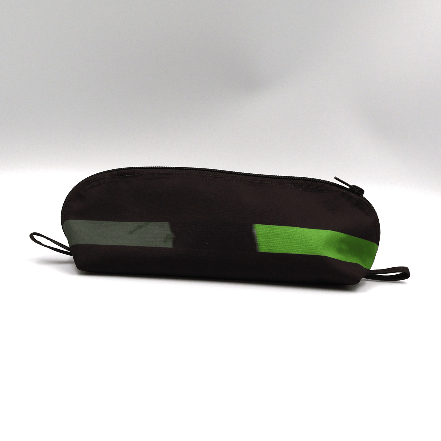 Pencil bag in bright colourful daisy stripe design on dark brown/black background.