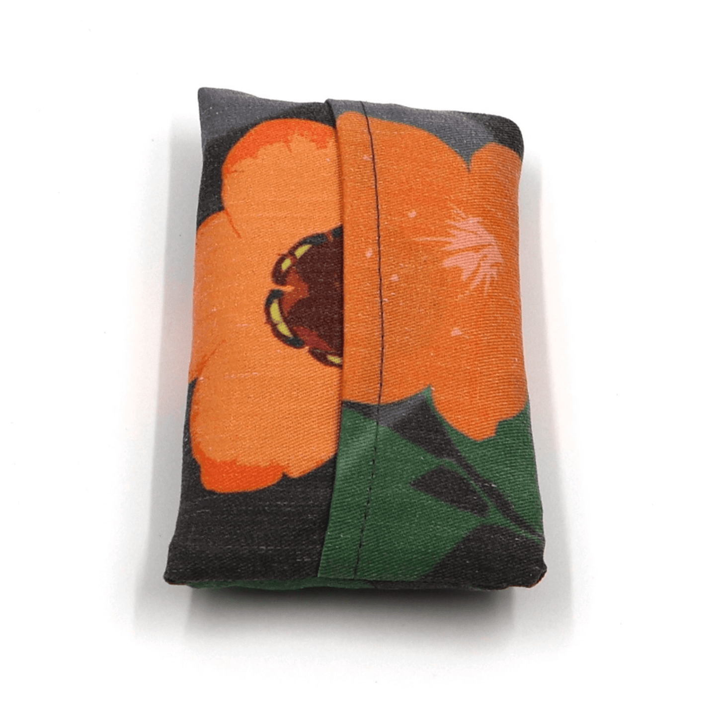 Fold up shopping bag with a bright daisy floral design on a black background. Fold view.
