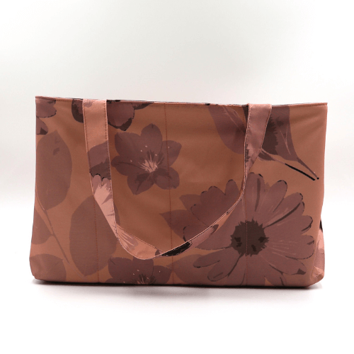 Large teacher/book bag with daisy floral design in rusty orange, brown and dark peach.