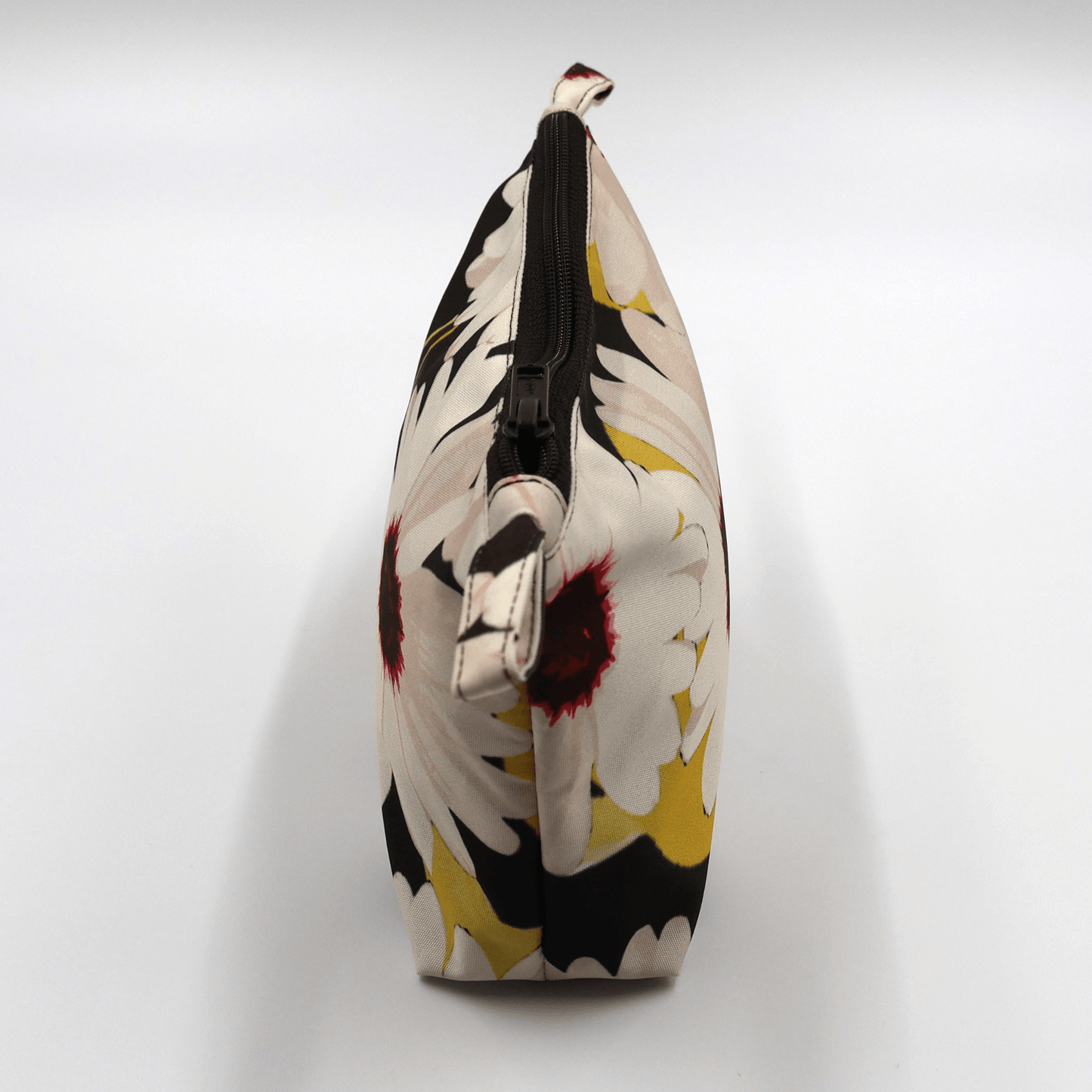 Ellie Makeup Bag in white and yellow floral design, zipped closure, durable and easy to clean, measuring 22cm L.