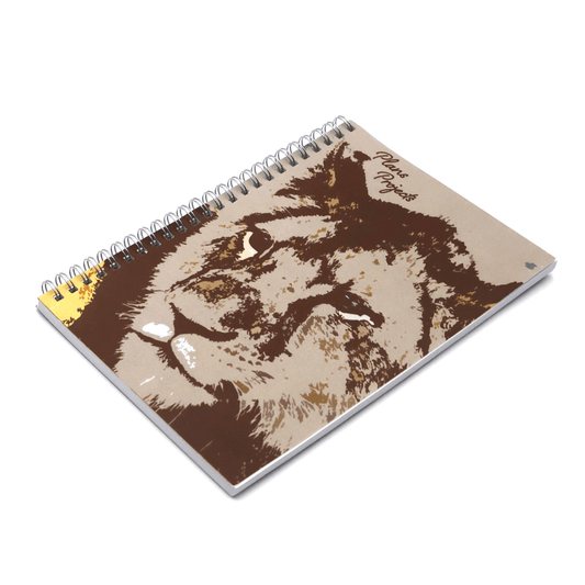 A5 notebook with face of lion design on front cover.