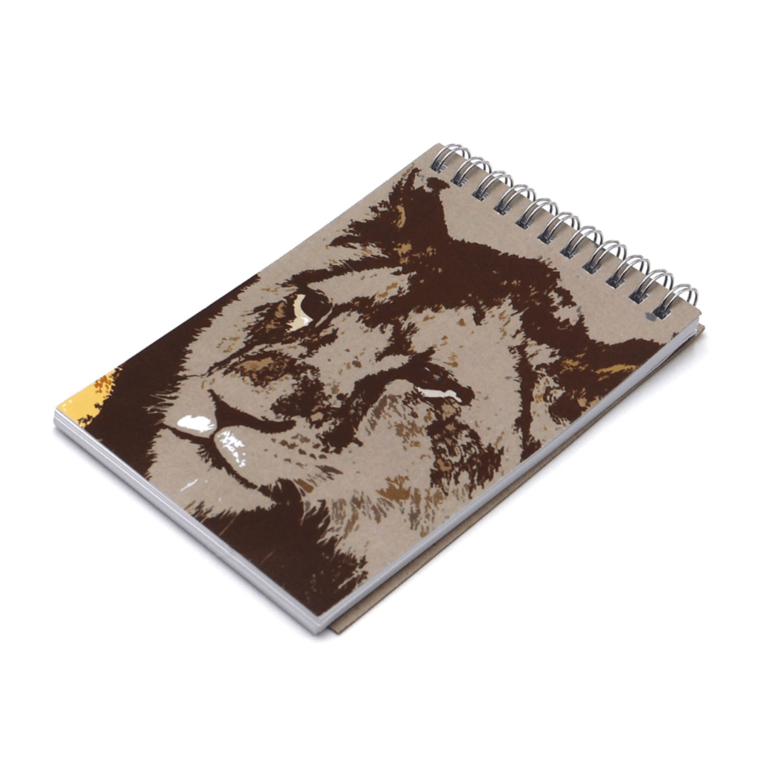 A6 notebook with face of lion design on front cover.