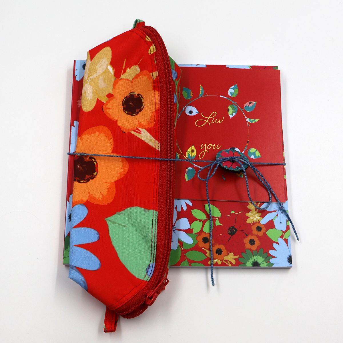 Handmade South African nature gift box neatly arranged with a wildflower drawing sketchpad a matching zippered canvas pencil case and a coordinated floral greeting card