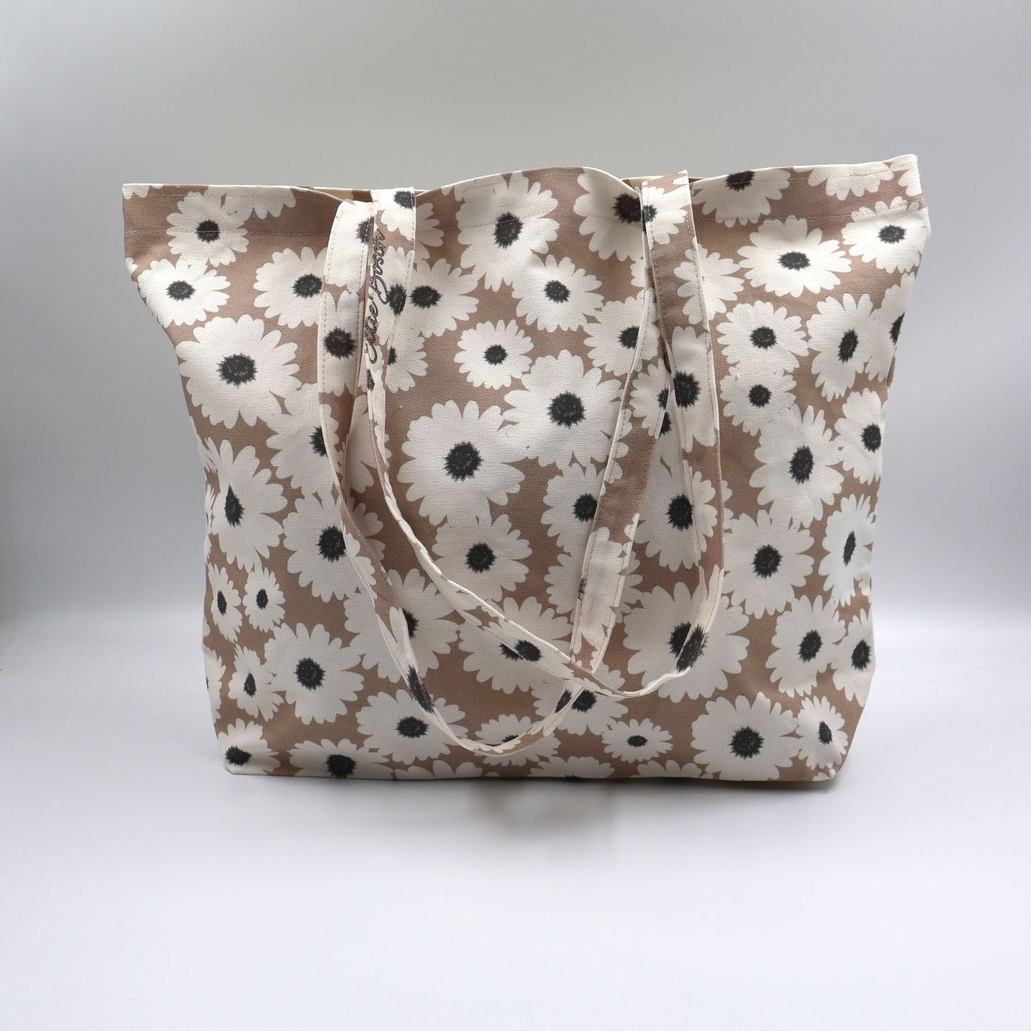 se up of Daisy Drift mushroom beige cotton canvas tote bag with white wildflowers made in South Africa