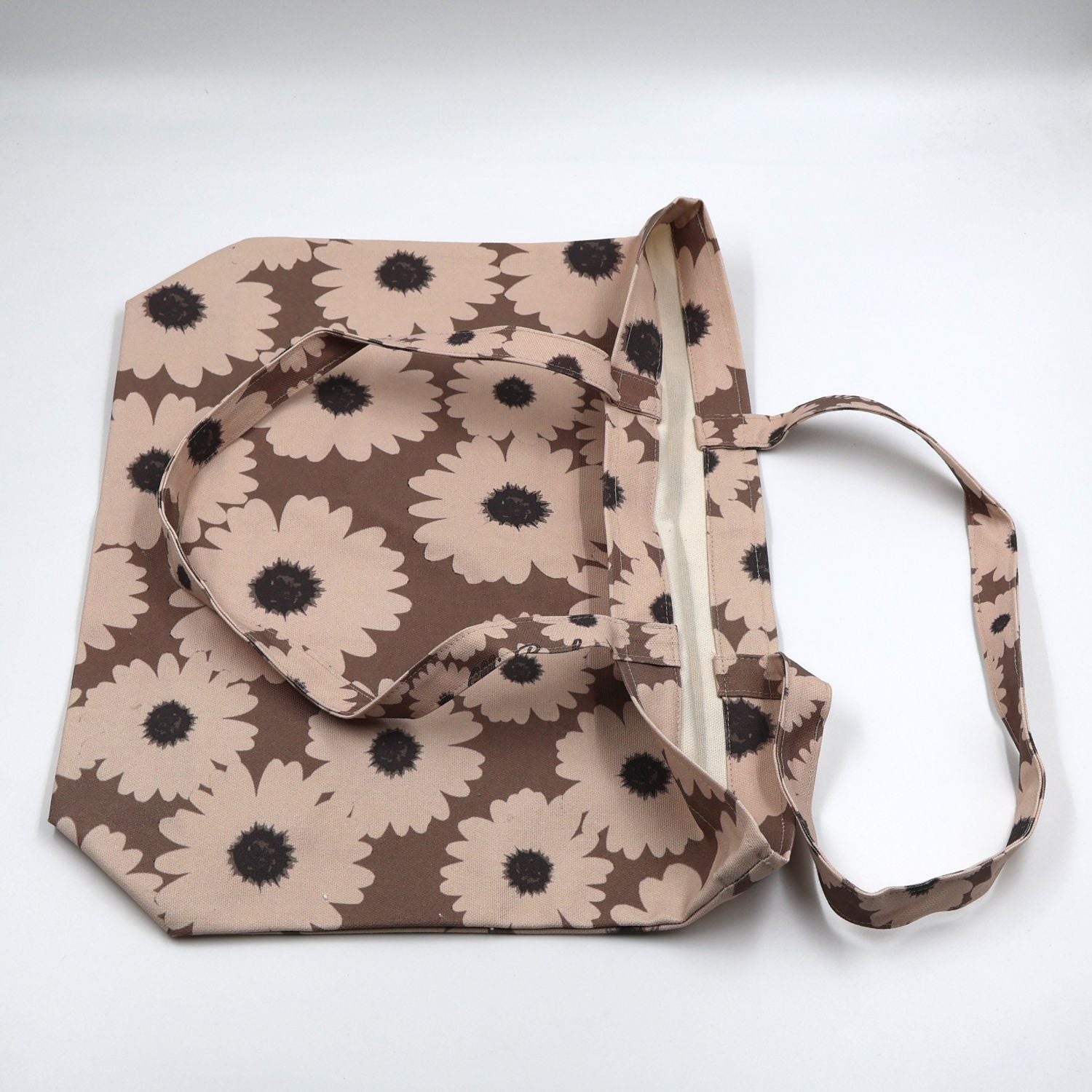 Close up view of quality stitching and finishes on Driftwood Brown canvas tote bag