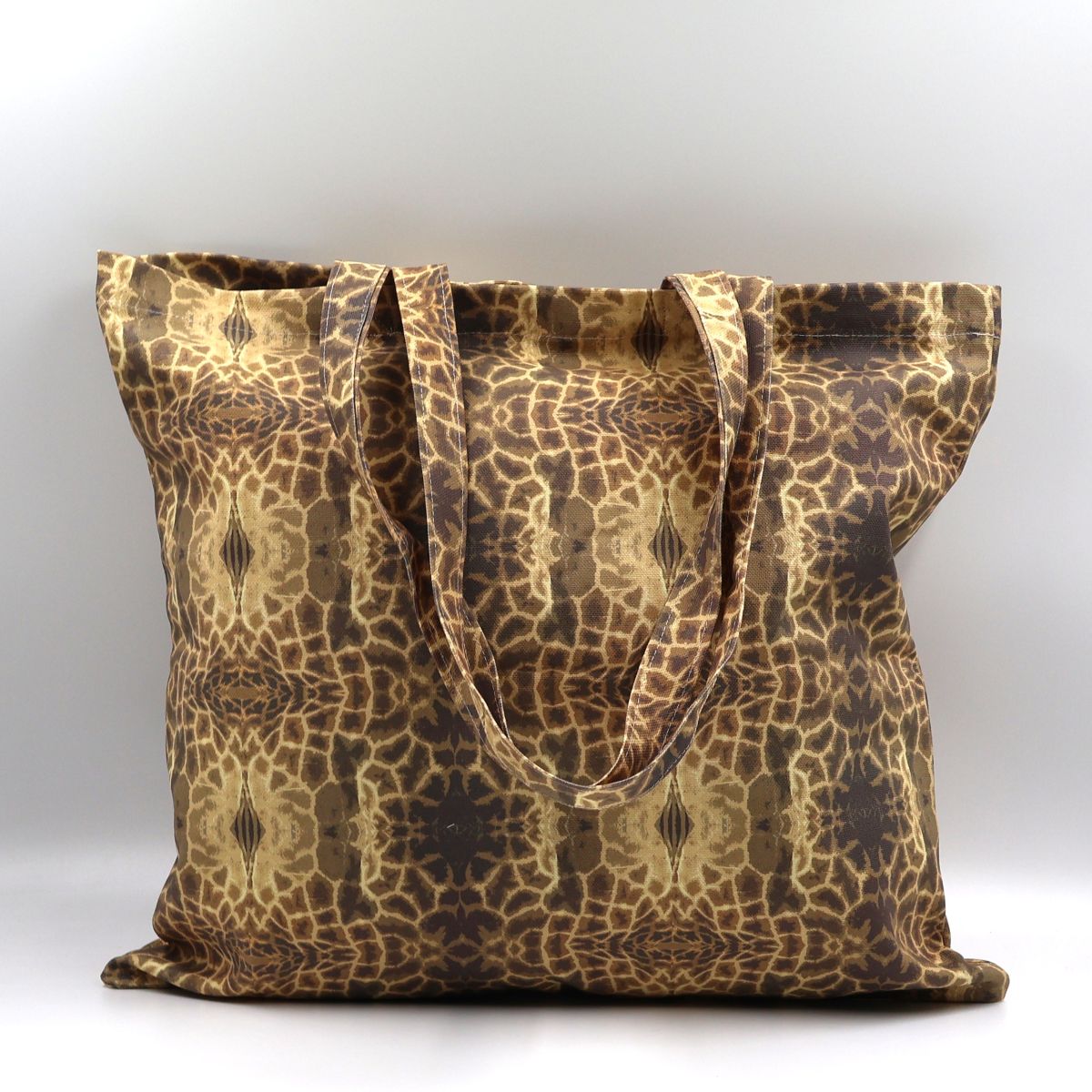 Front close up of Letheba brown giraffe print cotton canvas tote bag made in South Africa