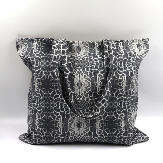 Front close up of Letheba charcoal giraffe print cotton canvas tote bag made in South Africa