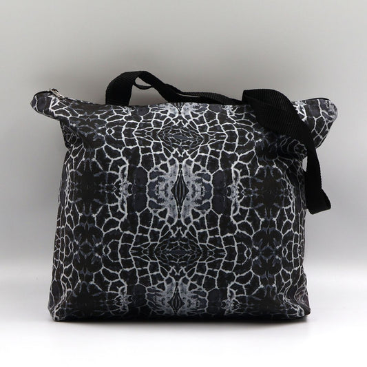 Front close up of Letheba charcoal waterproof zipped giraffe print canvas tote bag made in South Africa