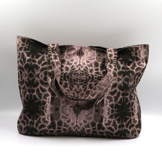 Front close up of Letheba dusky mauve and grey zipped giraffe print polyester canvas tote bag made in South Africa