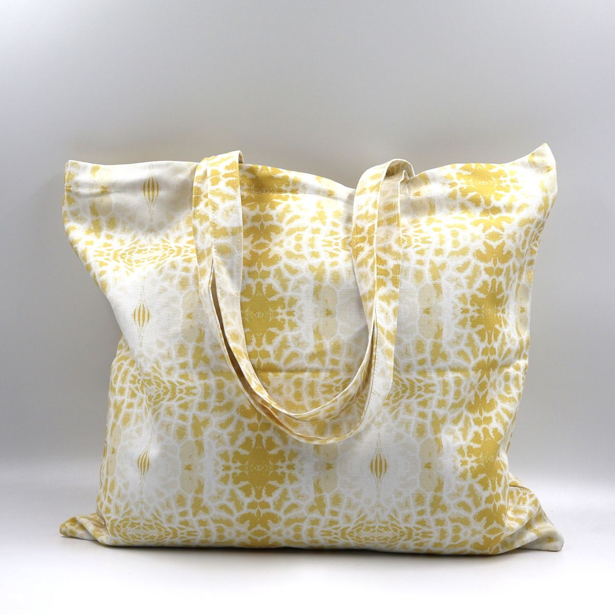 Front close up of Letheba yellow giraffe print cotton canvas tote bag made in South Africa