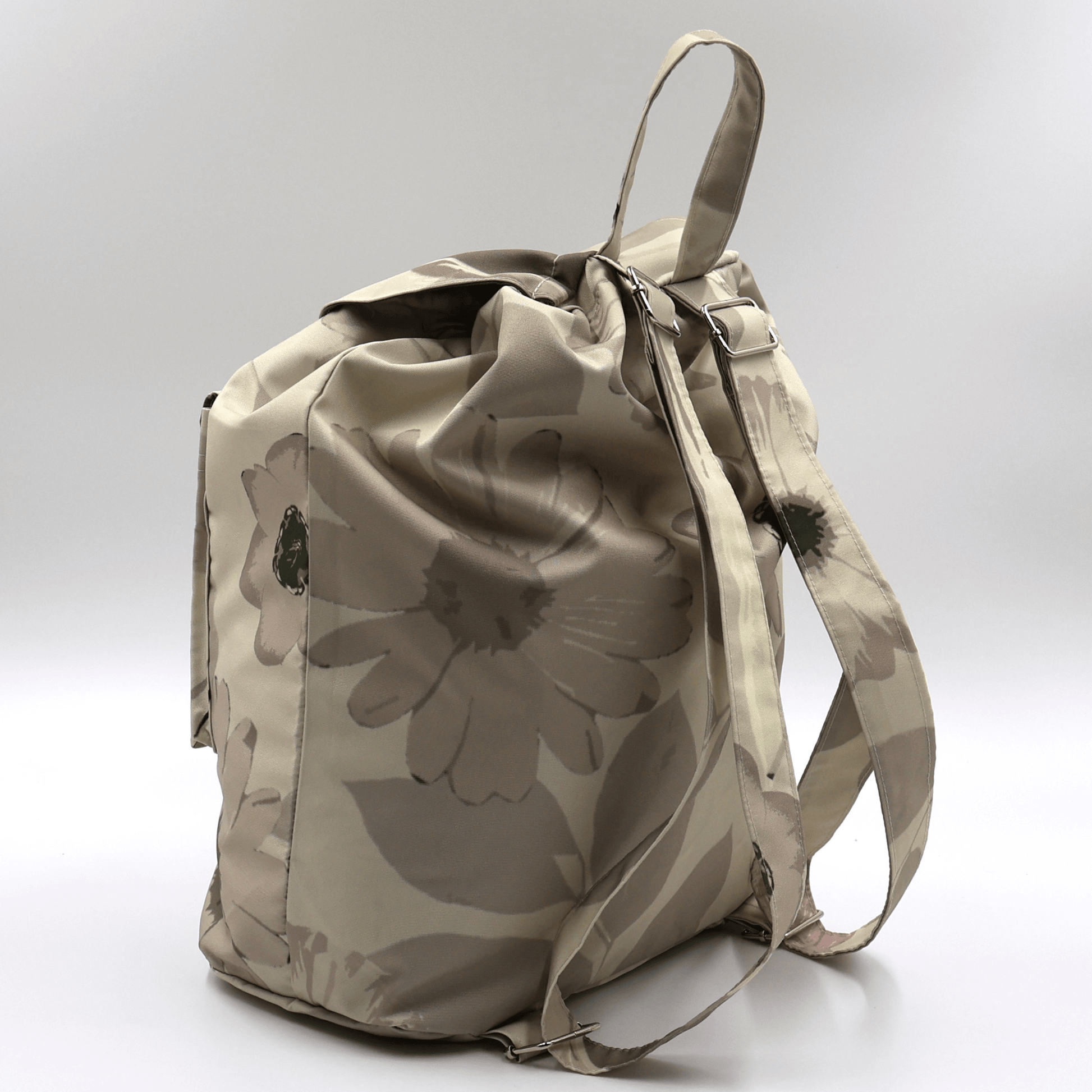 The lightweight beige canvas travel backpack with adjustable straps from the South African Stone Meadow collection.