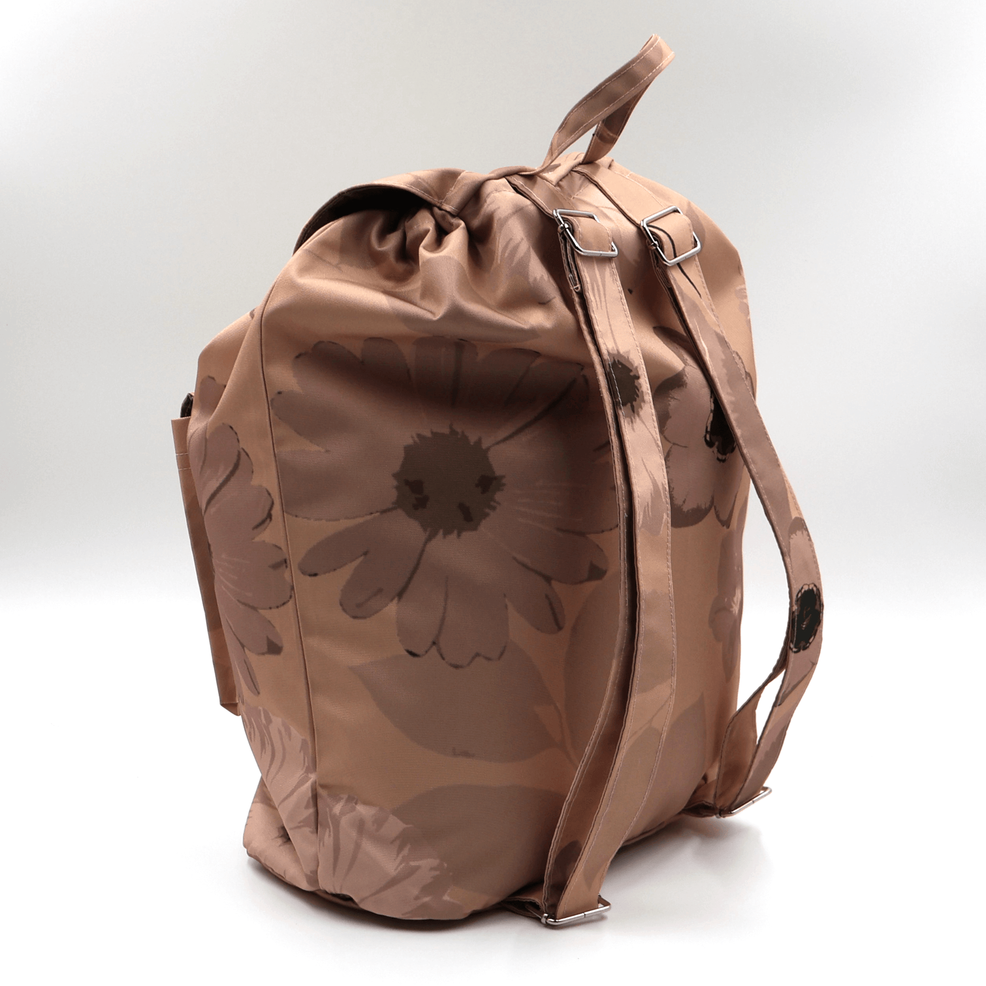 The lightweight orange canvas travel backpack with adjustable straps from the South African Stone Meadow collection.