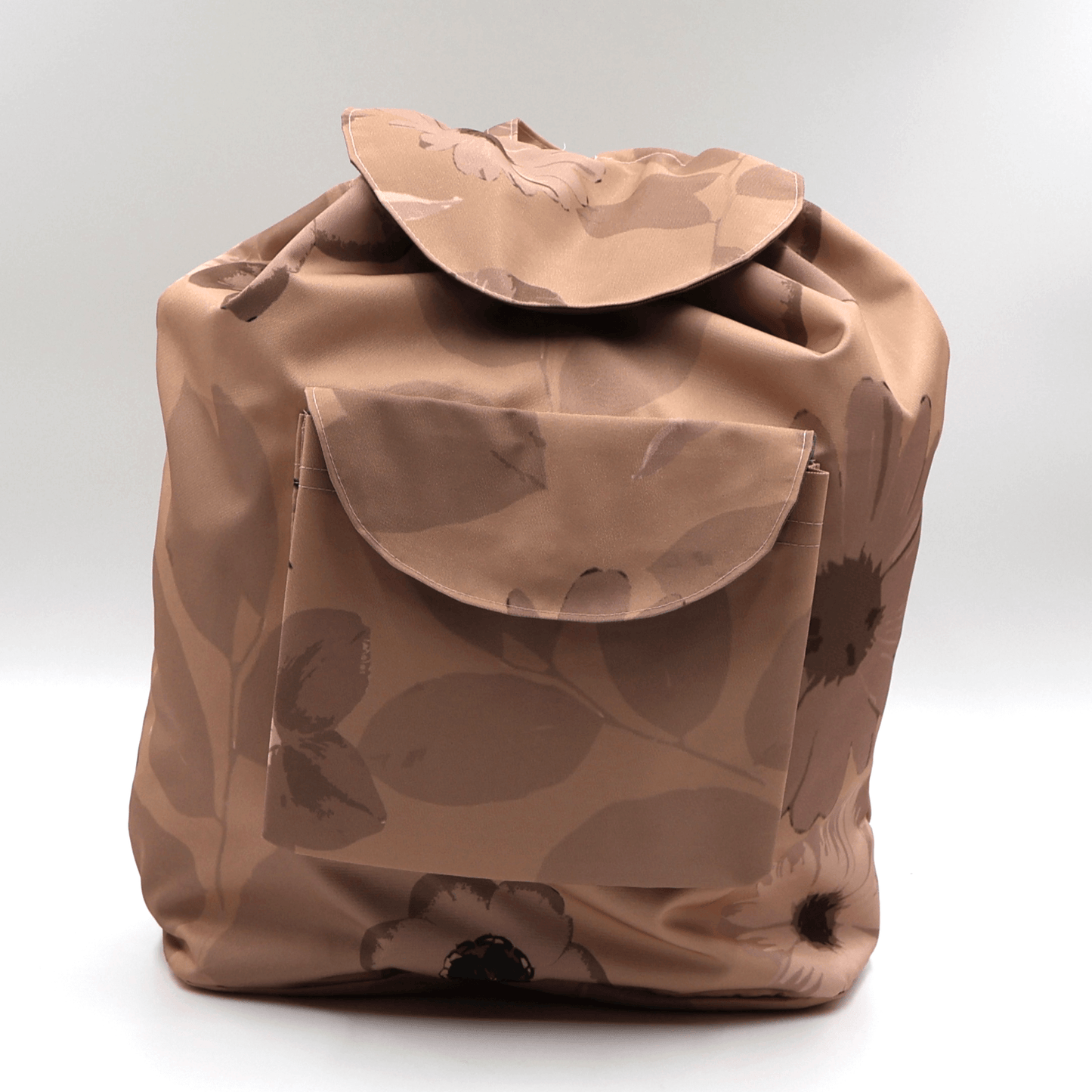Lightweight foldable canvas backpack for travel in South Africa featuring the Ellie B Peach Moon rusty orange and brown wildflower design