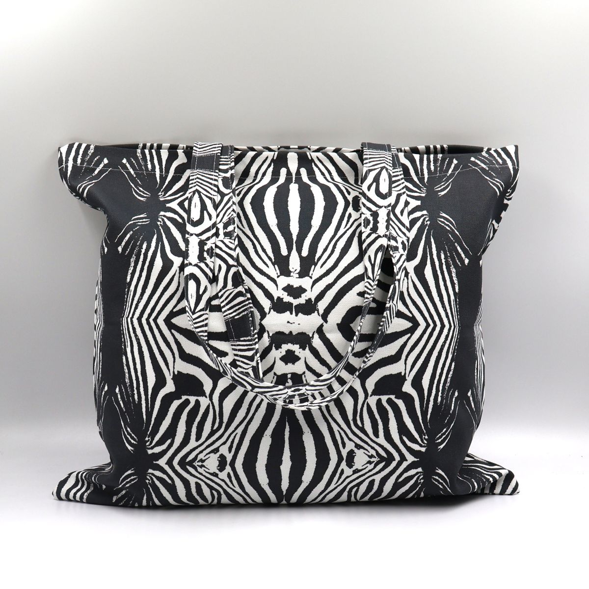 Front close up of Tshikwana bold zebra stripe cotton canvas tote bag made in South Africa