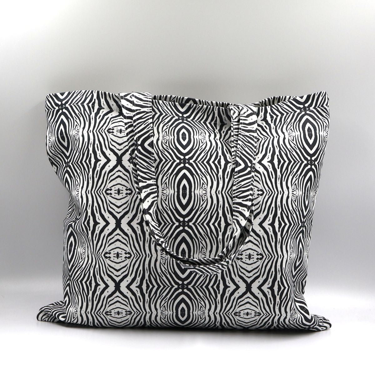 Front close up of Tshikwana Mohlala zebra print cotton canvas tote bag made in South Africa
