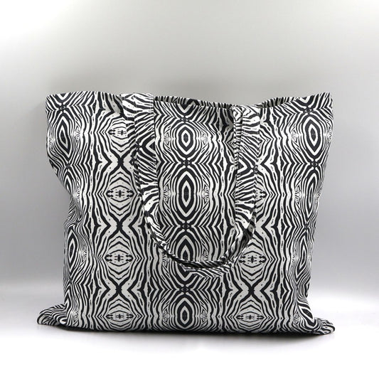 Front close up of Tshikwana Mohlala zebra print cotton canvas tote bag made in South Africa